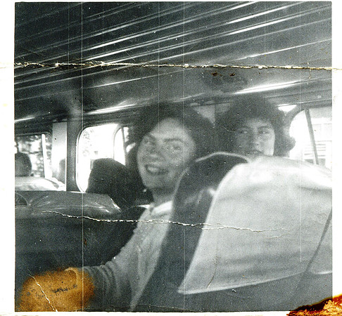 Joyce (closest to window) on school bus